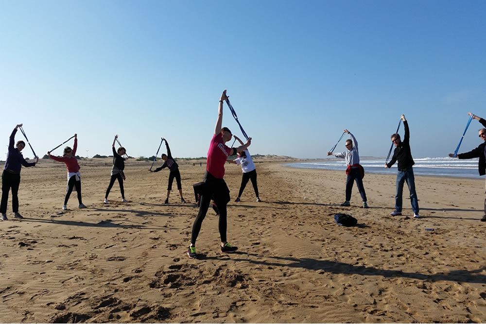 tourist do sport in the beach of essaouira